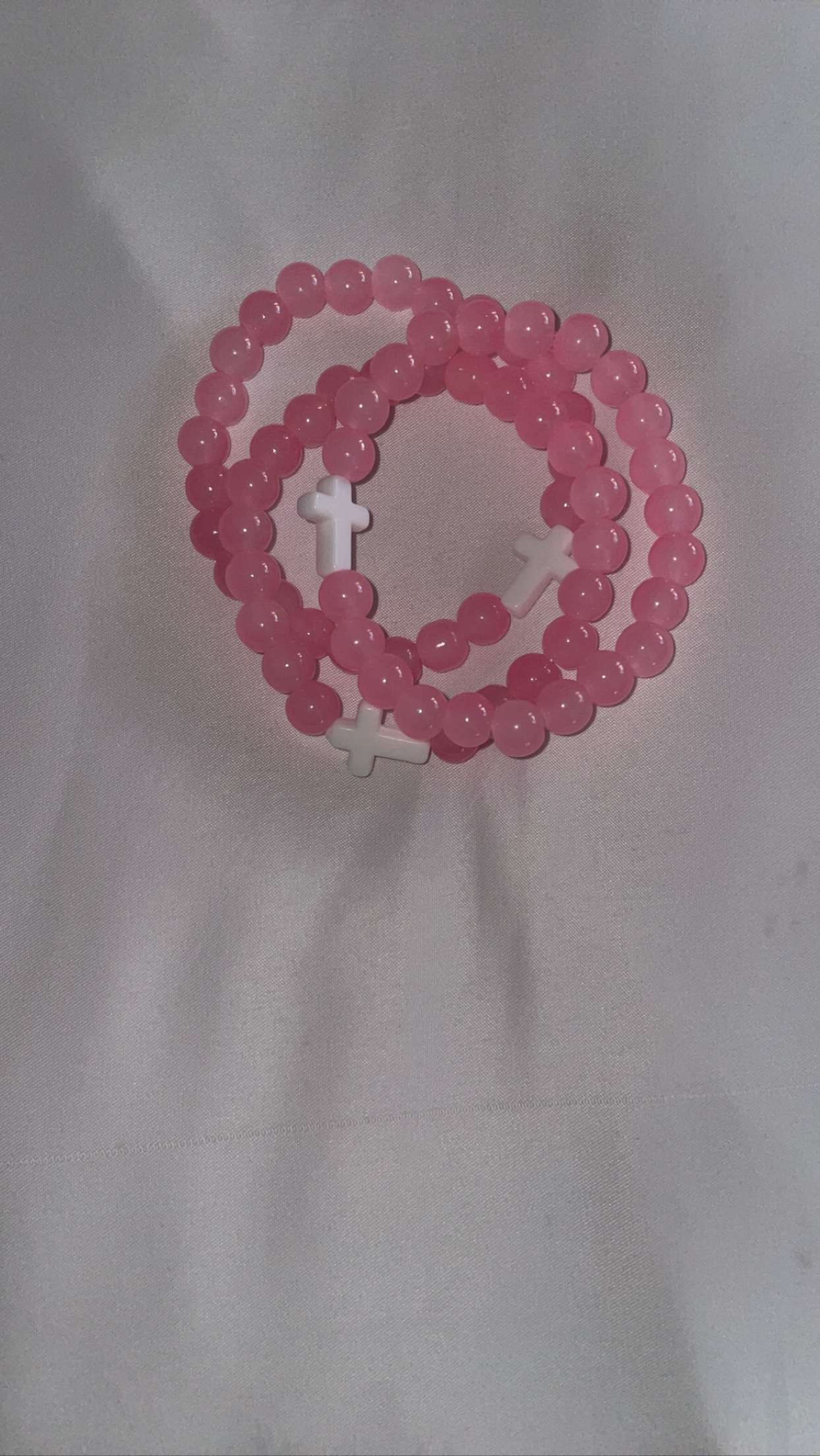 Pink cross bracelets